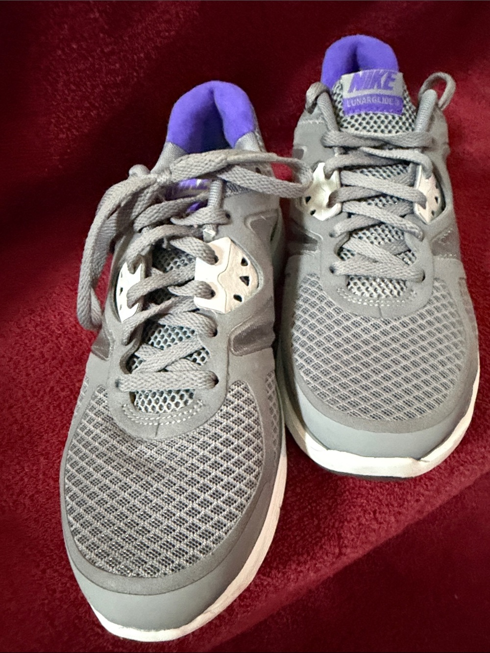 Nike Women's Gray Running Shoes with Purple Collar Accents
